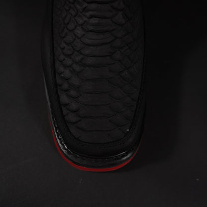 Botines negros doble cierre piton, suela roja