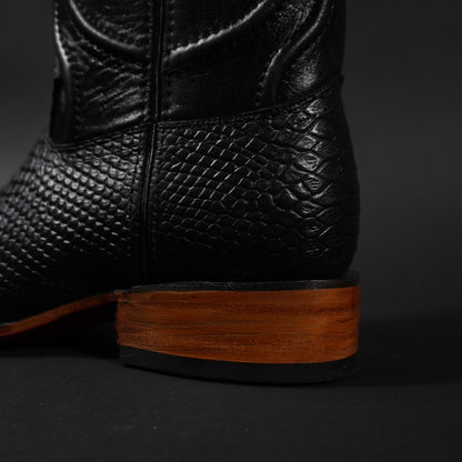Botas negras piton, suela roja y punta cuadrada